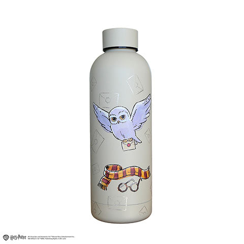 Bouteille isotherme Hedwige Harry Potter 500 ml en acier inoxydable, ornée de la chouette Hedwige, d'une écharpe Gryffondor et de lunettes.
