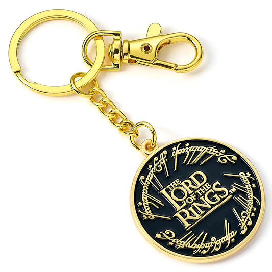 Porte-clés Le Seigneur des Anneaux noir et doré avec logo officiel et inscriptions elfiques autour du médaillon.