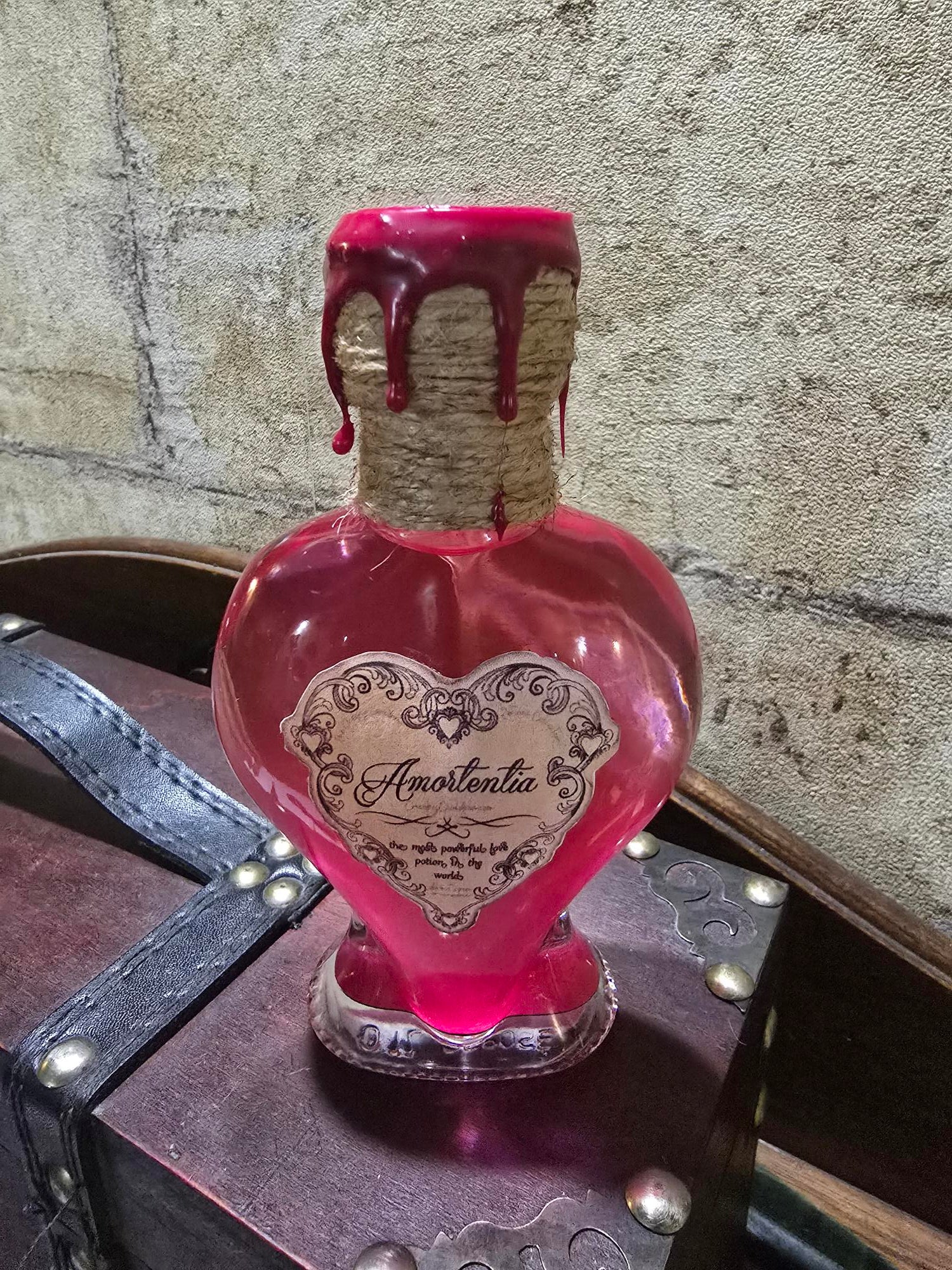 Potion Amortentia flacon cœur rose vers bleu avec cire rouge décoration magique